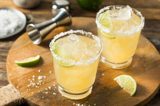 full tequila margarita glasses with lime salt
