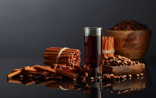 ferino distillery liqueur with cinnamon sticks and coffee beans