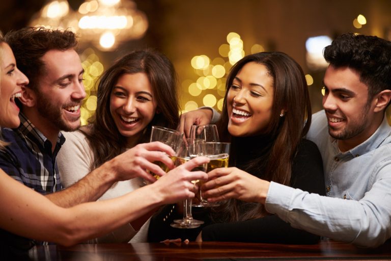 group of friends enjoying carbliss drinks together