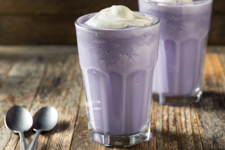 ube cream liqueur purple milkshake cocktails in glasses with spoons