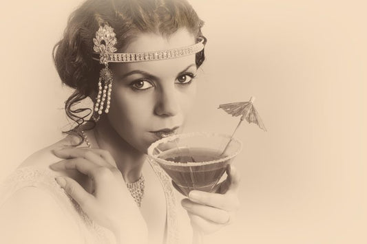 1920s flapper woman drinking prohibition cocktail