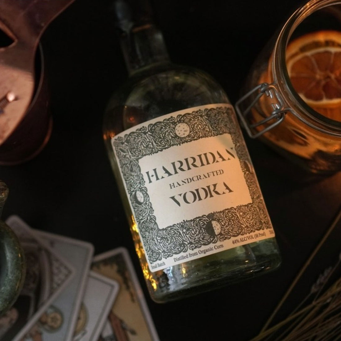 Harridan Vodka bottle laying down on a table.